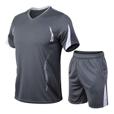 人の夏ランニングのスポーツは衣服の短い袖のTシャツを5分の速い乾燥身に着けている