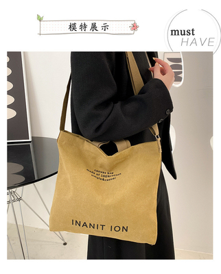 男性と女性のクロスボディバッグ 洗ったキャンバス 厚いハンドバッグ 大容量 トレンド URBAN ART 学生バッグ