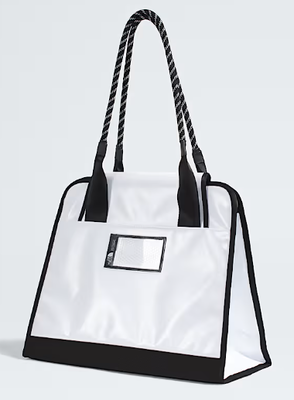 Burly Tote Bag Designed with Rope Inspired Handles and Front Adjustable Straps Offering Large Secure Zip Pocket Key Hook and Topographic Lining